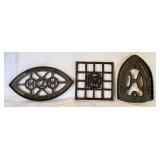LR - Set of 3 Antique Cast Iron Trivets Including The WM Howell Co and H2H Pattern