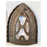 LR - Set of 3 Antique Cast Iron Trivets Including The WM Howell Co and H2H Pattern