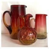 MB - Two Vintage Amberina Glass Pitchers and One Vintage Coin Dot Amberina Cruet