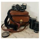 LR - Olympus OM-1 35mm SLR Camera Set with Lenses, Flash, and Leather Case