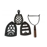 LR - Set of 4 Antique Cast Iron Sad Iron Trivets