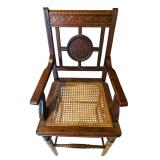 LR - Antique Wooden Chair with Cane Seat and Floral Carved Backrest