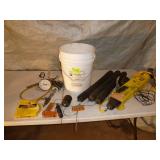 Pail of Pressure Test Plugs