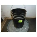 Black Pail of Pipe Fittings