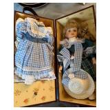 Porcelain Doll with Wood Carrying Case and Two Outfits