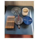 Kitchenware Collection with Glass Bowl, Ceramic Planter, Blue Storage Container, Bamboo Trivet, and Metal Kettle