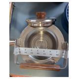 Kitchenware Collection with Glass Bowl, Ceramic Planter, Blue Storage Container, Bamboo Trivet, and Metal Kettle