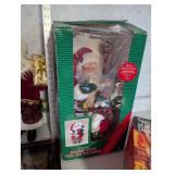 Santa Claus Figurine Collection with Framed Santa Art and Animated Holiday Scenes