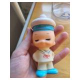 Nautical Decor Lot with Sailor Dolls, Blue Ship Jar, and Large Seashell