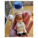 Nautical Decor Lot with Sailor Dolls, Blue Ship Jar, and Large Seashell