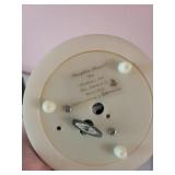 Collection of Decorative Collectibles and Figurines Including Angel Globe and Porcelain Masks