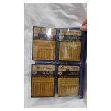 Lot of baseball Figurines, Catchers Mitt, and Trading Cards