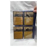 Lot of baseball Figurines, Catchers Mitt, and Trading Cards