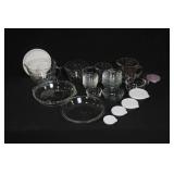 Collection of Pampered Chef Glass Mixing Bowls, Pie Plates, and Storage Lids