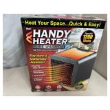 New Handy Heater Pure Warmth Ceramic Space Heater with LED Lights