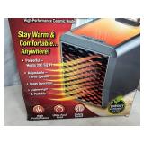 New Handy Heater Pure Warmth Ceramic Space Heater with LED Lights