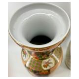 Pair of Decorative Porcelain Vases with Floral and Bird Designs