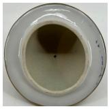 Decorative Porcelain Vase and Ginger Jar with Ornate Floral Patterns