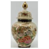 Collection of 4 Decorative Porcelain Vases and Jars with Floral Motifs