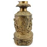 Antique Brass Table Lamp With Ornate Relief Figures & Filigree Base