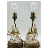 Pair of Porcelain Figural Lamps with Ornate Gilt Accented Bases