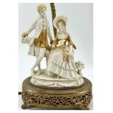 Pair of Porcelain Figural Lamps with Ornate Gilt Accented Bases