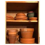 G  - Collection of Mixed Clay and Plastic Flower Pots and Saucers