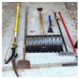 G - Assorted Yard and Snow Tools Including Pruner, Shovel, Brooms, and Snow Pushers