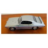 LR - Set of 2 Die-Cast Model Cars - 1957 Chevy Bel Air and Pontiac GTO