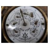 ANTIQUE BRASS AND PORCELAIN WATER METER