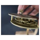 ANTIQUE BRASS AND PORCELAIN WATER METER