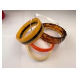 Collection of Colorful Plastic and Wood Bangle Bracelets
