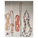Collection of 7 Vintage Beaded and Shell Necklaces with Religious and Animal Charms
