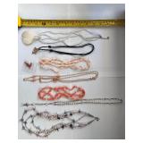 Collection of 7 Vintage Beaded and Shell Necklaces with Religious and Animal Charms