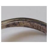 Elegant Ring with Purple Gemstone and Clear Stones