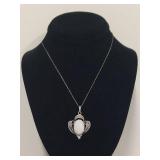 Elegant Silver Necklace with Intricate White Opal Pendant