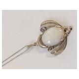 Elegant Silver Necklace with Intricate White Opal Pendant