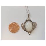 Elegant Silver Necklace with Intricate White Opal Pendant