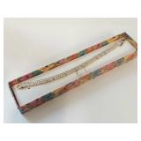 Elegant Gold-Tone Bracelet with Diamond-Like Stones