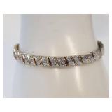 Elegant Gold-Tone Bracelet with Diamond-Like Stones