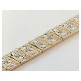 Elegant Gold-Tone Bracelet with Diamond-Like Stones