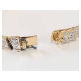 Elegant Gold-Tone Bracelet with Diamond-Like Stones