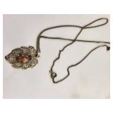 Collection of Vintage Agate, Shell Cameo, Dinosaur Bone Pendant, Mother of Pearl, and Carnelian Jewelry Brooches and Pendants