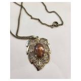 Collection of Vintage Agate, Shell Cameo, Dinosaur Bone Pendant, Mother of Pearl, and Carnelian Jewelry Brooches and Pendants