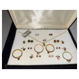 Jewelry Set with Rings, Earrings, and Pendant in Display Cases