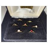 Jewelry Set with Rings, Earrings, and Pendant in Display Cases