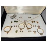 Jewelry Set with Rings, Earrings, and Pendant in Display Cases