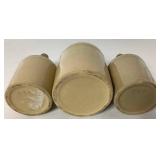 Collection of Single Handle Whiskey Jugs, Pair of Crock Jugs and Pickling Crock