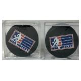 USA Hockey Black Pucks Autographed by Alana Blahok #18 and Karen Bye #6