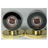 Pair of Dallas Stars Autographed Hockey Pucks 2000 - Mike Keane #12, Guy Carbonneau #21, Brett Hull and Jamie Wright